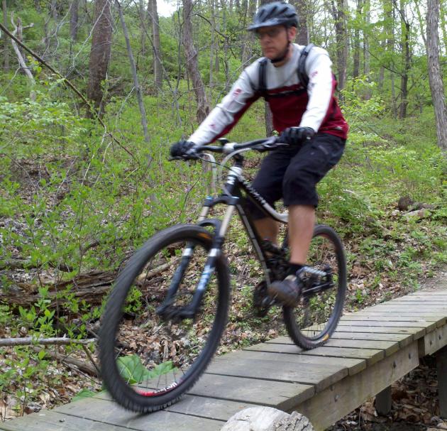 The author on one of the wooden bridges on the mountain bike trail in Cleveland Metroparks' Ohio & Erie Canal Reservation
