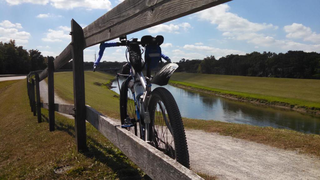A bicycle on the Ohio & Erie Canal Towpath Trail near the Tuscarawas River and downtown Massillon, Ohio.